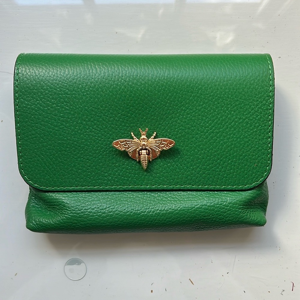 Green leather crossbody purse with golden bee clasp